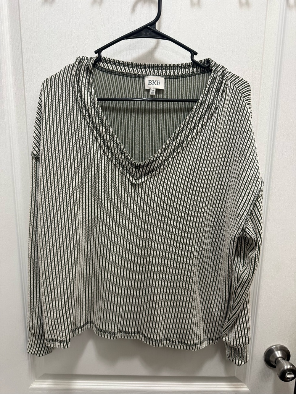 BKE Women's Black and White Vertical Stripe V-Neck Sweater